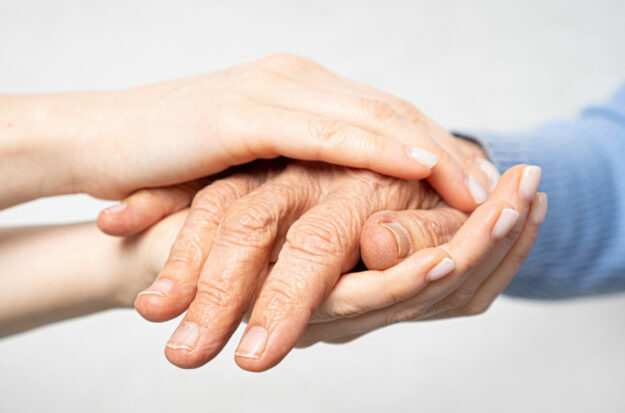 Young,Hands,Hold,Old,Hands.,Support,For,The,Elderly,Concept.